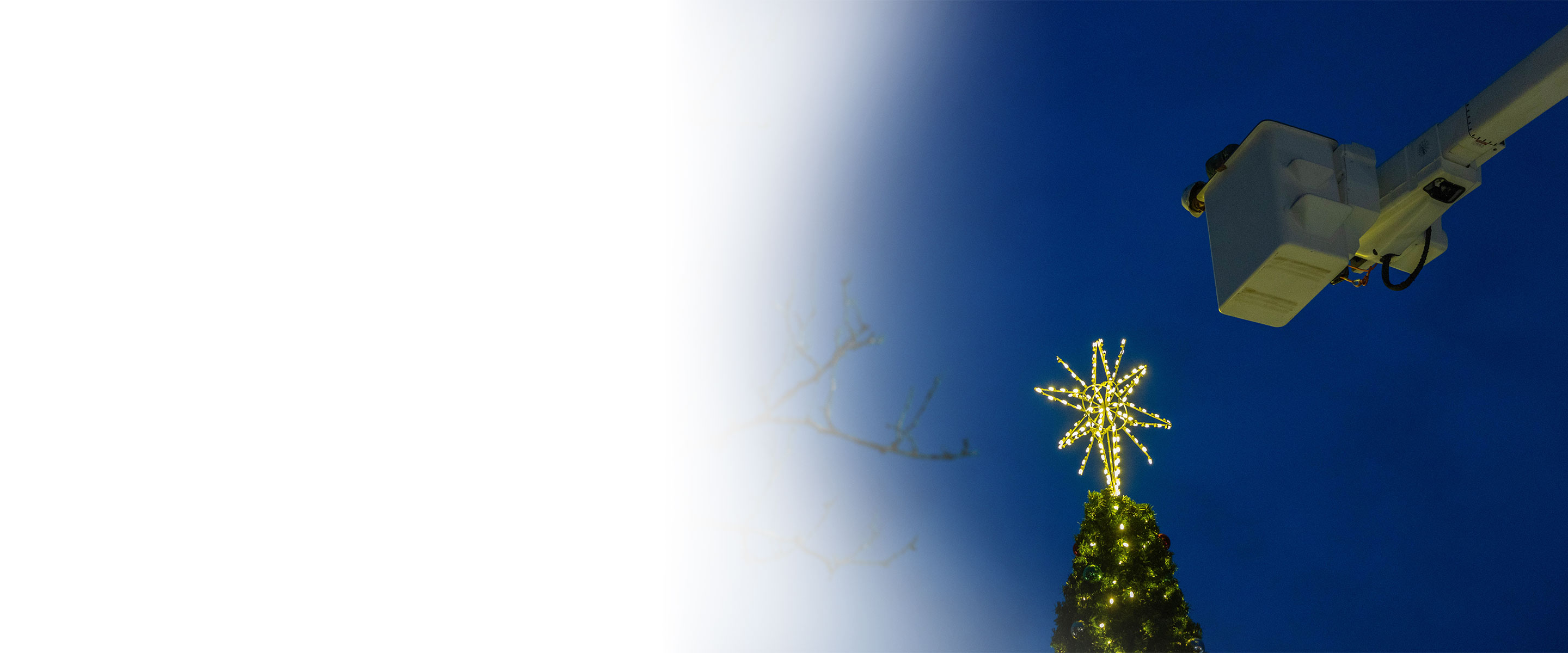 tree lighting with PPL boom truck